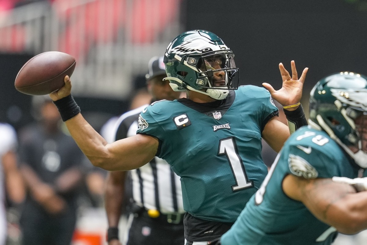 Jalen Hurts completed his first six passes, including an 18-yard TD to DeVonta Smith against the Falcons
